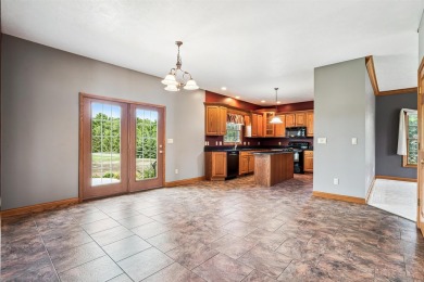 Set in a highly desirable neighborhood near the golf course on Hart Ridge Golf Course in Iowa - for sale on GolfHomes.com, golf home, golf lot