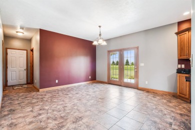 Set in a highly desirable neighborhood near the golf course on Hart Ridge Golf Course in Iowa - for sale on GolfHomes.com, golf home, golf lot
