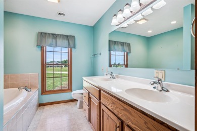 Set in a highly desirable neighborhood near the golf course on Hart Ridge Golf Course in Iowa - for sale on GolfHomes.com, golf home, golf lot