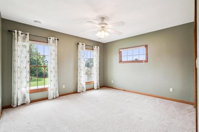 Set in a highly desirable neighborhood near the golf course on Hart Ridge Golf Course in Iowa - for sale on GolfHomes.com, golf home, golf lot