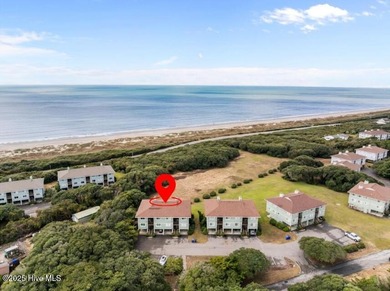 Discover this beautifully renovated, fully furnished end unit on Oak Island Golf Club in North Carolina - for sale on GolfHomes.com, golf home, golf lot