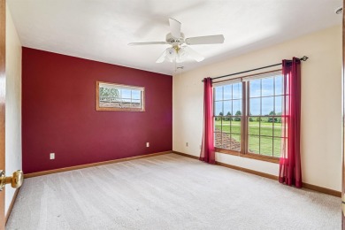Set in a highly desirable neighborhood near the golf course on Hart Ridge Golf Course in Iowa - for sale on GolfHomes.com, golf home, golf lot