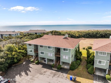 Discover this beautifully renovated, fully furnished end unit on Oak Island Golf Club in North Carolina - for sale on GolfHomes.com, golf home, golf lot