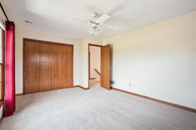 Set in a highly desirable neighborhood near the golf course on Hart Ridge Golf Course in Iowa - for sale on GolfHomes.com, golf home, golf lot