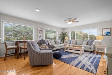 Discover this beautifully renovated, fully furnished end unit on Oak Island Golf Club in North Carolina - for sale on GolfHomes.com, golf home, golf lot