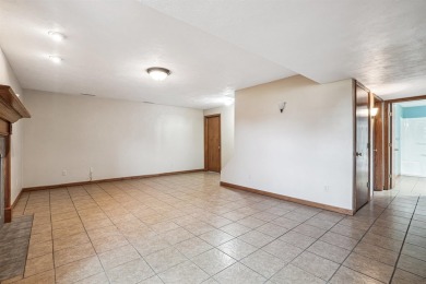 Set in a highly desirable neighborhood near the golf course on Hart Ridge Golf Course in Iowa - for sale on GolfHomes.com, golf home, golf lot