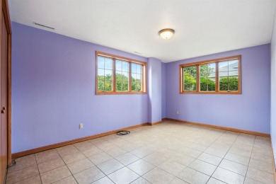 Set in a highly desirable neighborhood near the golf course on Hart Ridge Golf Course in Iowa - for sale on GolfHomes.com, golf home, golf lot