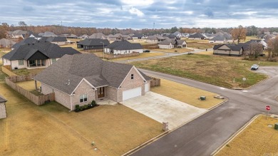 All Brick beautiful home with bonus and three car garage on a on Paragould Country Club in Arkansas - for sale on GolfHomes.com, golf home, golf lot