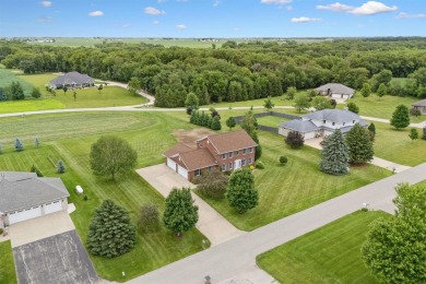 Set in a highly desirable neighborhood near the golf course on Hart Ridge Golf Course in Iowa - for sale on GolfHomes.com, golf home, golf lot