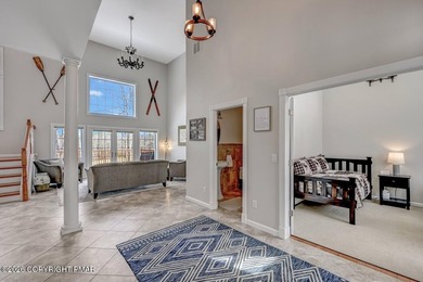 Welcome to this spacious 5-bedroom home, ideally situated on a on Pinecrest Lake Golf and Country Club in Pennsylvania - for sale on GolfHomes.com, golf home, golf lot