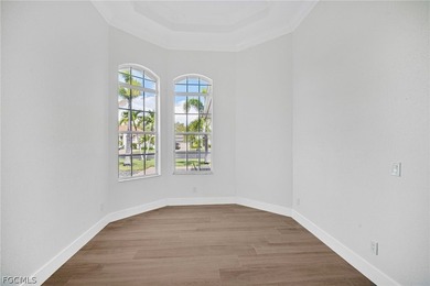 Welcome to your dream home in the highly sought-after Coco Bay on Kelly Greens Golf and Country Club in Florida - for sale on GolfHomes.com, golf home, golf lot