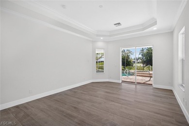 Welcome to your dream home in the highly sought-after Coco Bay on Kelly Greens Golf and Country Club in Florida - for sale on GolfHomes.com, golf home, golf lot