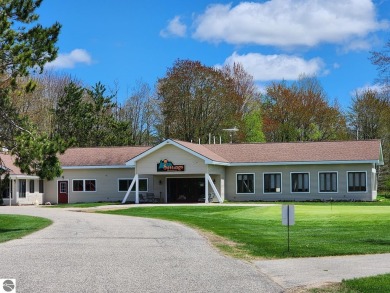 Golf, Hunt  Relax!  Nestled in the heart of Lakes of the North on Lakes of the North Deer Run Golf Course in Michigan - for sale on GolfHomes.com, golf home, golf lot
