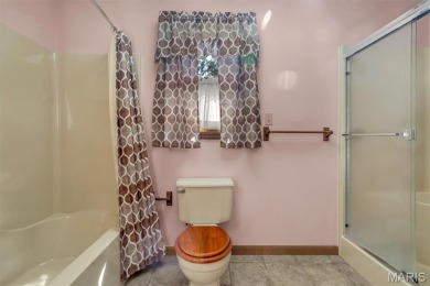 Welcome to 9431 Easy Street in the sought-after Raintree on Raintree Country Club in Missouri - for sale on GolfHomes.com, golf home, golf lot