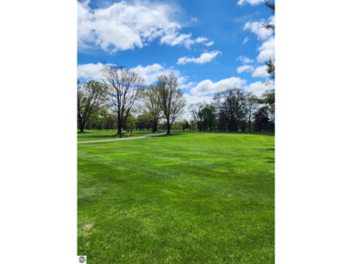 Golf, Hunt  Relax!  Nestled in the heart of Lakes of the North on Lakes of the North Deer Run Golf Course in Michigan - for sale on GolfHomes.com, golf home, golf lot