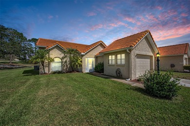GOLFER'S DELIGHT! END UNIT with stunning GOLF COURSE VIEWS on on Highland Lakes Executive Golf Course in Florida - for sale on GolfHomes.com, golf home, golf lot