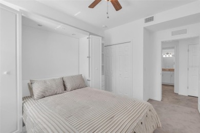 This exquisite FIRST FLOOR COACH home is just steps from one of on Heritage Landing Golf  in Florida - for sale on GolfHomes.com, golf home, golf lot