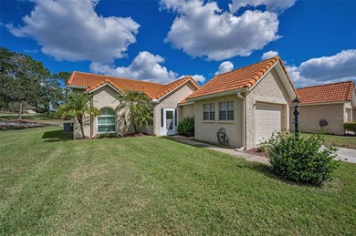 GOLFER'S DELIGHT! END UNIT with stunning GOLF COURSE VIEWS on on Highland Lakes Executive Golf Course in Florida - for sale on GolfHomes.com, golf home, golf lot