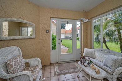 GOLFER'S DELIGHT! END UNIT with stunning GOLF COURSE VIEWS on on Highland Lakes Executive Golf Course in Florida - for sale on GolfHomes.com, golf home, golf lot