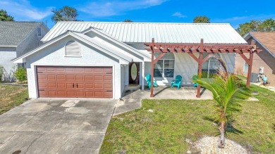 Discover your coastal retreat at Seaclusion Beach, located on Holiday Golf Club in Florida - for sale on GolfHomes.com, golf home, golf lot