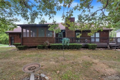 Welcome to 9431 Easy Street in the sought-after Raintree on Raintree Country Club in Missouri - for sale on GolfHomes.com, golf home, golf lot