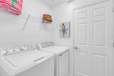 This exquisite FIRST FLOOR COACH home is just steps from one of on Heritage Landing Golf  in Florida - for sale on GolfHomes.com, golf home, golf lot