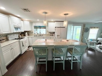 Step into this beautifully maintained 2-BD, 2-BA home that on Del Tura Golf and Country Club in Florida - for sale on GolfHomes.com, golf home, golf lot