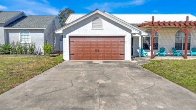 Discover your coastal retreat at Seaclusion Beach, located on Holiday Golf Club in Florida - for sale on GolfHomes.com, golf home, golf lot