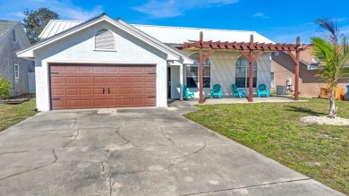 Discover your coastal retreat at Seaclusion Beach, located on Holiday Golf Club in Florida - for sale on GolfHomes.com, golf home, golf lot