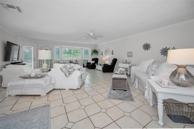 GOLFER'S DELIGHT! END UNIT with stunning GOLF COURSE VIEWS on on Highland Lakes Executive Golf Course in Florida - for sale on GolfHomes.com, golf home, golf lot