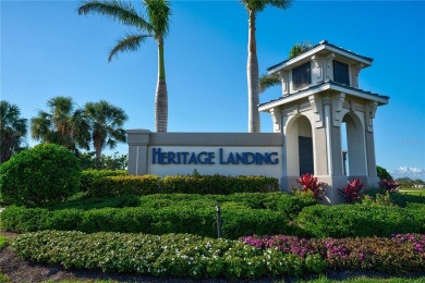 This exquisite FIRST FLOOR COACH home is just steps from one of on Heritage Landing Golf  in Florida - for sale on GolfHomes.com, golf home, golf lot