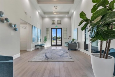 This exquisite FIRST FLOOR COACH home is just steps from one of on Heritage Landing Golf  in Florida - for sale on GolfHomes.com, golf home, golf lot