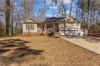 The beautiful three-bedroom, two-bath home in the gated golf on Carolina Trace Country Club in North Carolina - for sale on GolfHomes.com, golf home, golf lot