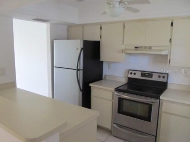 Located in the middle of just about anything you could need on Capri Isle Golf Club in Florida - for sale on GolfHomes.com, golf home, golf lot