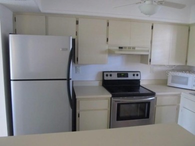 Located in the middle of just about anything you could need on Capri Isle Golf Club in Florida - for sale on GolfHomes.com, golf home, golf lot