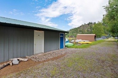 Keep your boats dry with this 12'x30' covered boathouse with on Eagle Bend Golf Course in Montana - for sale on GolfHomes.com, golf home, golf lot