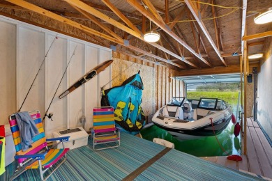 Keep your boats dry with this 12'x30' covered boathouse with on Eagle Bend Golf Course in Montana - for sale on GolfHomes.com, golf home, golf lot