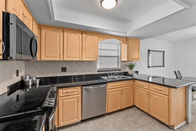 One or more photo(s) has been virtually staged. PRICED TO SELL - on East Lake Woodlands Country Club in Florida - for sale on GolfHomes.com, golf home, golf lot