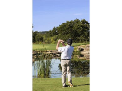 Located in the highly desirable gated community of Reflection on Hideout Golf Club and Resort  in Texas - for sale on GolfHomes.com, golf home, golf lot