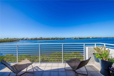 Awaken to sunny, sweeping views of the Intracoastal Waterway and on Lemon Bay Golf Club in Florida - for sale on GolfHomes.com, golf home, golf lot