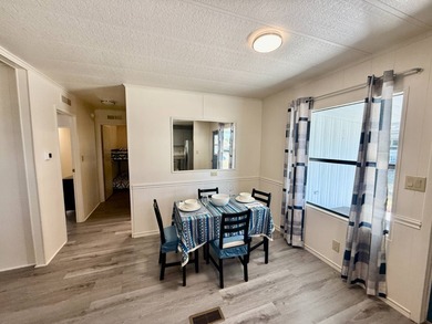 Home is located in Water Oak Country Club Estates, an active 55 on Water Oak Country Club Estates in Florida - for sale on GolfHomes.com, golf home, golf lot