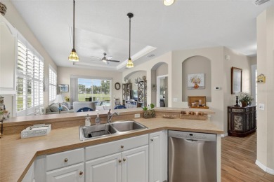 Beautiful Pool Home situated on the golf course in Sun City on Caloosa Greens Executive Golf Course in Florida - for sale on GolfHomes.com, golf home, golf lot