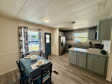 Home is located in Water Oak Country Club Estates, an active 55 on Water Oak Country Club Estates in Florida - for sale on GolfHomes.com, golf home, golf lot