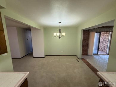 Beautifully Maintained Brick Ranch - Move-In Ready with timeless on The Olde Course At Loveland in Colorado - for sale on GolfHomes.com, golf home, golf lot