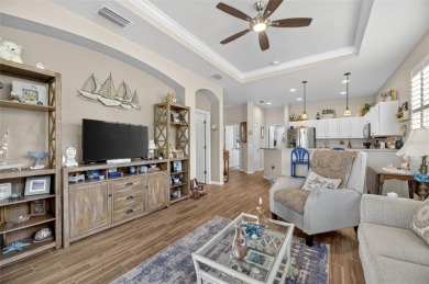 Beautiful Pool Home situated on the golf course in Sun City on Caloosa Greens Executive Golf Course in Florida - for sale on GolfHomes.com, golf home, golf lot