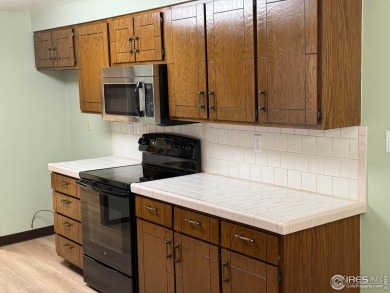 Beautifully Maintained Brick Ranch - Move-In Ready with timeless on The Olde Course At Loveland in Colorado - for sale on GolfHomes.com, golf home, golf lot
