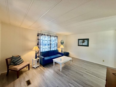 Home is located in Water Oak Country Club Estates, an active 55 on Water Oak Country Club Estates in Florida - for sale on GolfHomes.com, golf home, golf lot