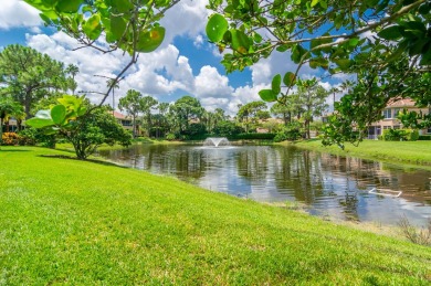 Enjoy beautiful lake views from one of the largest 3 bedroom on PGA National Golf Club in Florida - for sale on GolfHomes.com, golf home, golf lot