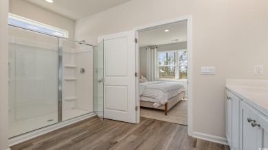 This home has 2 bedrooms and a flex room with french doors on Brunswick Plantation and Golf Resorts in North Carolina - for sale on GolfHomes.com, golf home, golf lot