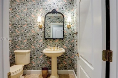 Experience refined living in this beautifully updated home on Colleton River Plantation Club in South Carolina - for sale on GolfHomes.com, golf home, golf lot